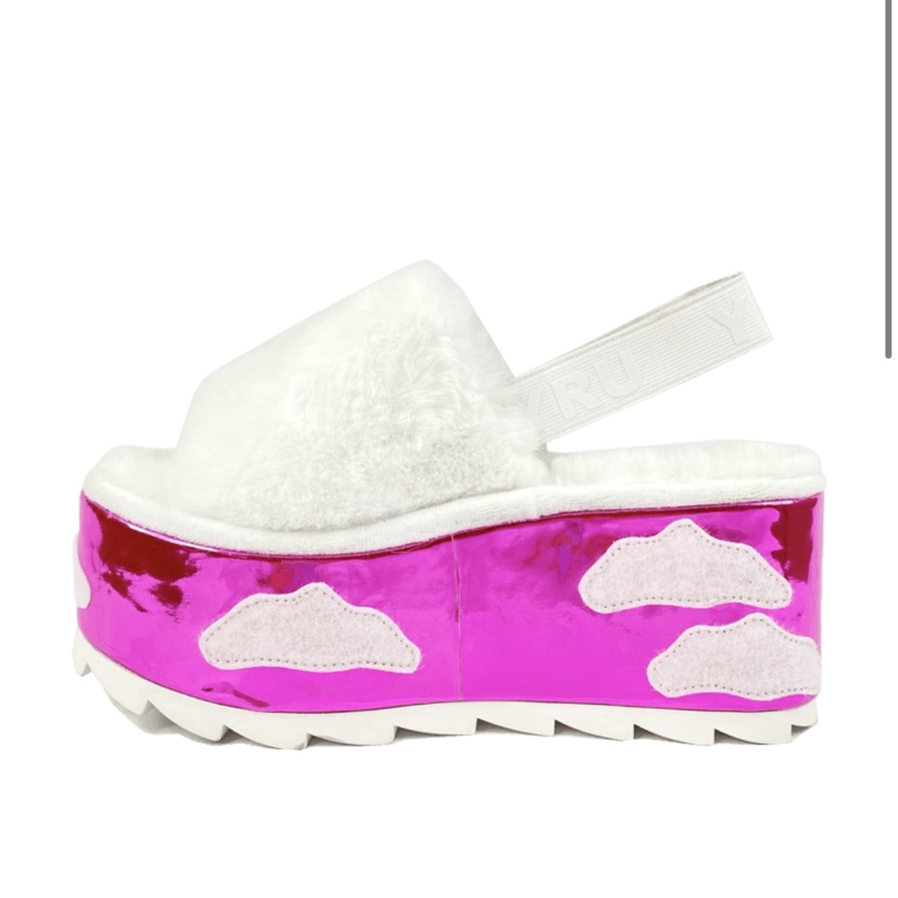 YRU Qozi slide in sunset sky